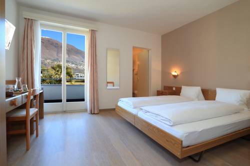 Imagen de la habitación del Hotel Ascona Lodge, Pool and Garden Retreat. Foto 15