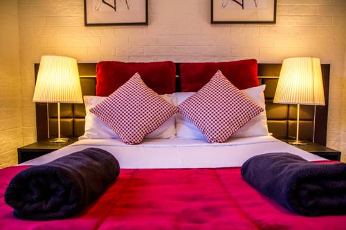 Imagen de la habitación del Hotel Ascot Budget Inn and Residences. Foto 6