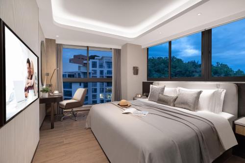 Imagen de la habitación del Hotel Ascott Dadonghai Bay Sanya. Foto 15