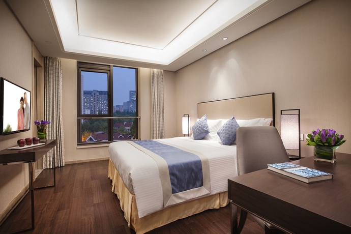 Imagen de la habitación del Hotel Ascott Heng Shan Shanghai. Foto 7