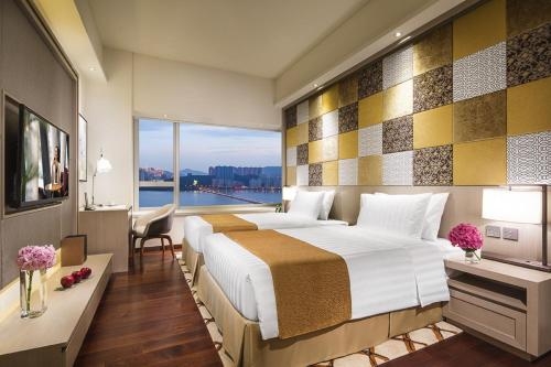 Imagen de la habitación del Hotel Ascott Macau. Foto 7