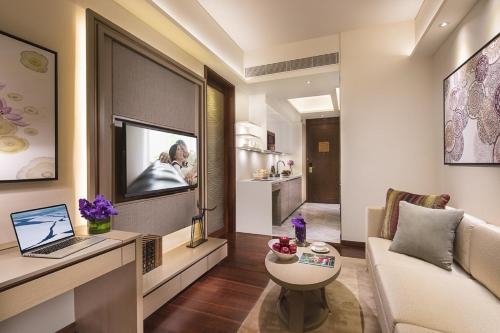 Imagen de la habitación del Hotel Ascott Macau. Foto 8