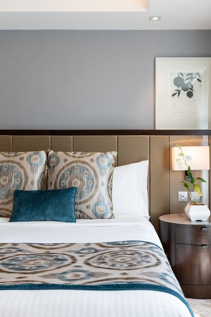 Imagen de la habitación del Hotel Ascott Makati. Foto 9