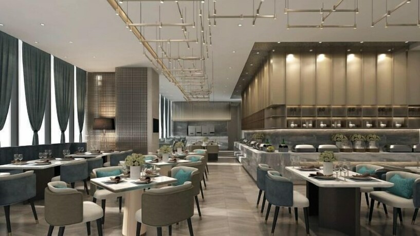 Imagen del bar/restaurante del Hotel Ascott New District Wuxi. Foto 11