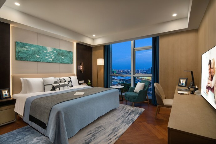 Imagen de la habitación del Hotel Ascott New District Wuxi. Foto 13