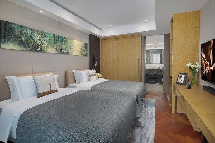 Imagen de la habitación del Hotel Ascott New District Wuxi. Foto 15