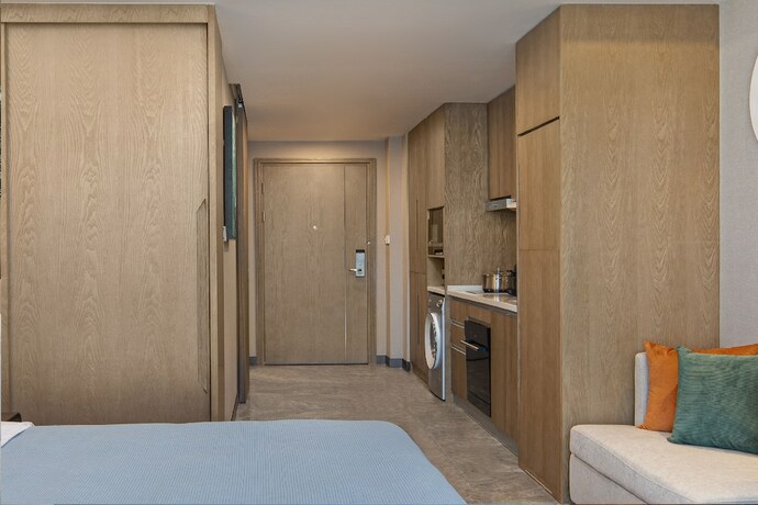 Imagen de la habitación del Hotel Ascott New District Wuxi. Foto 17