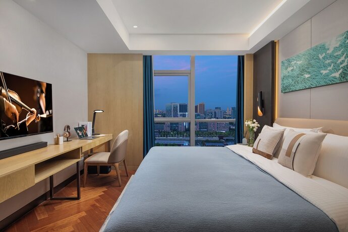Imagen de la habitación del Hotel Ascott New District Wuxi. Foto 20