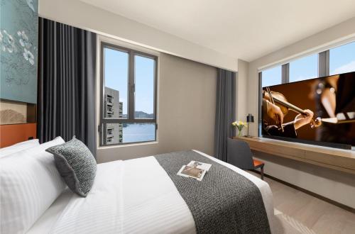 Imagen de la habitación del Hotel Ascott North Point Hong Kong. Foto 13