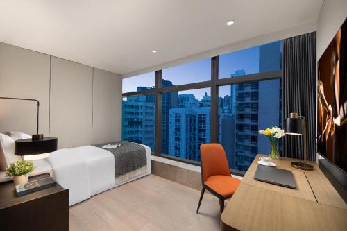Imagen de la habitación del Hotel Ascott North Point Hong Kong. Foto 15