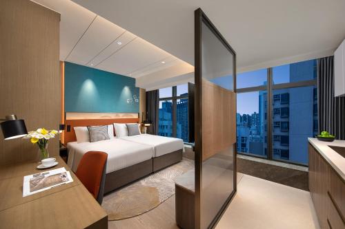 Imagen de la habitación del Hotel Ascott North Point Hong Kong. Foto 17