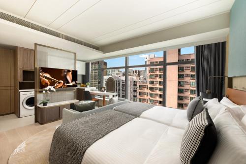 Imagen de la habitación del Hotel Ascott North Point Hong Kong. Foto 19