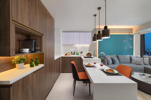 Imagen de la habitación del Hotel Ascott North Point Hong Kong. Foto 20