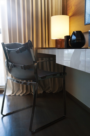 Imagen de la habitación del Hotel Ascott Orchard Singapore. Foto 3