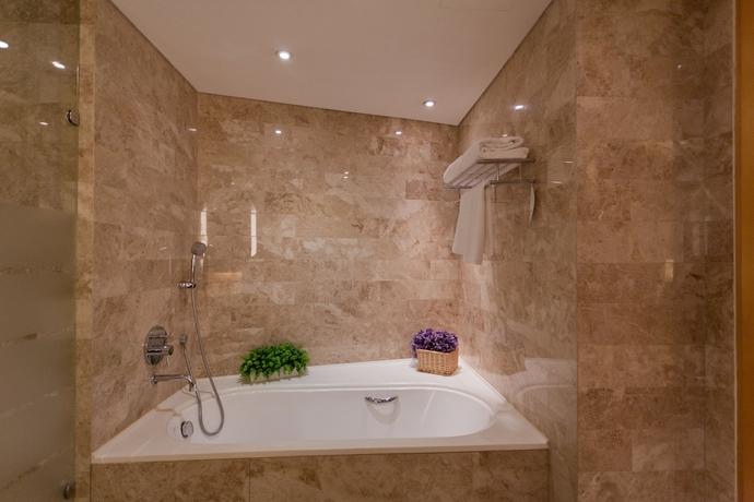 Imagen de la habitación del Hotel Ascott Raffles City Beijing. Foto 2