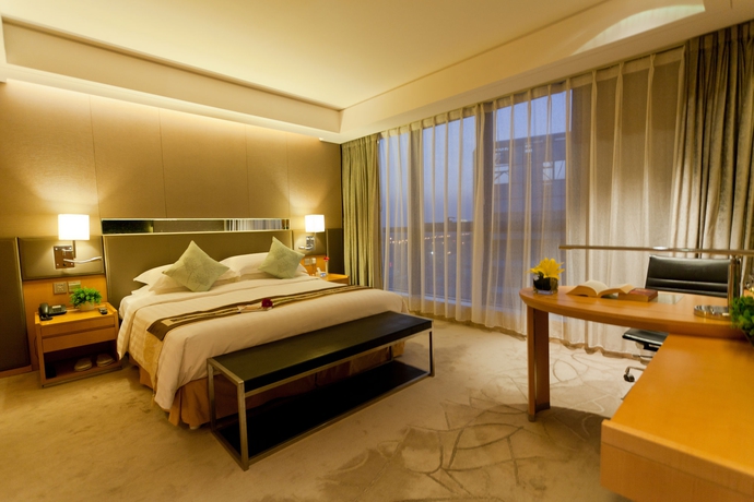 Imagen de la habitación del Hotel Ascott Raffles City Beijing. Foto 3