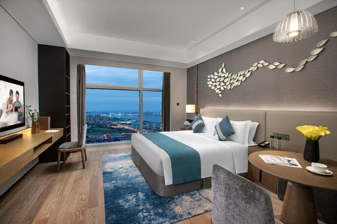Imagen de la habitación del Hotel Ascott Xiangjiang Ffc Changsha. Foto 17