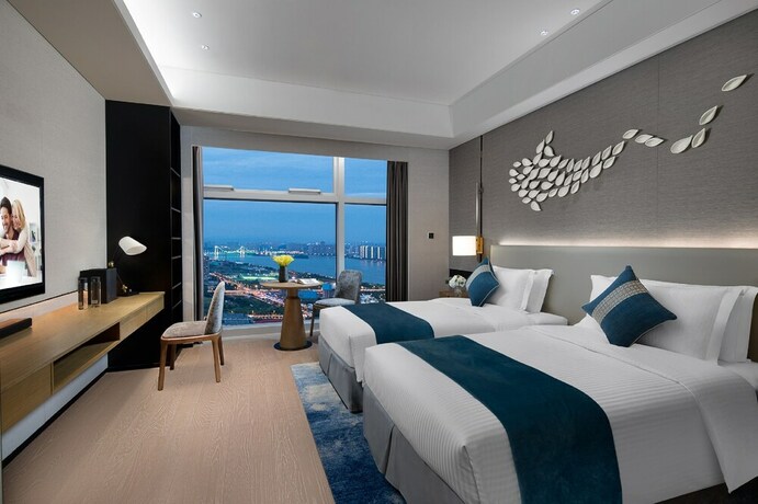 Imagen de la habitación del Hotel Ascott Xiangjiang Ffc Changsha. Foto 18