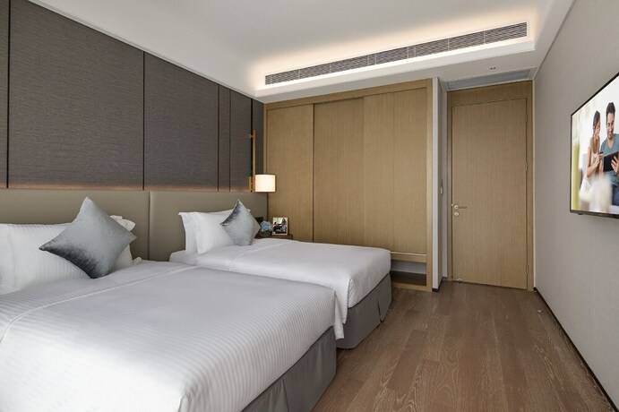 Imagen de la habitación del Hotel Ascott Xiangjiang Ffc Changsha. Foto 23