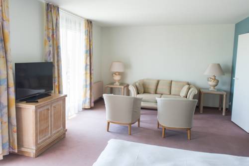 Imagen de la habitación del Hotel Ascott & Restaurant. Foto 10