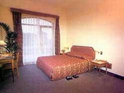 Imagen de la habitación del Hotel Asean International. Foto 3