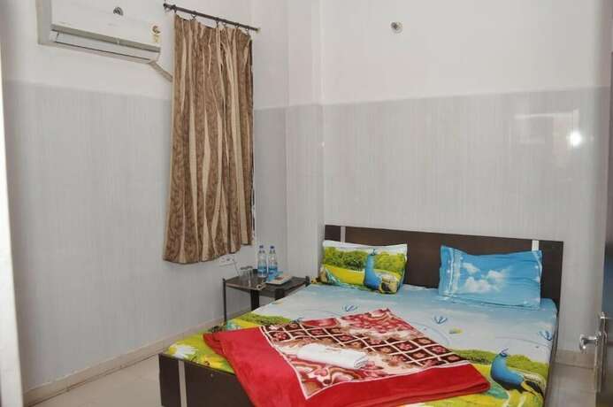 Imagen de la habitación del Hotel Asha Guest House. Foto 17