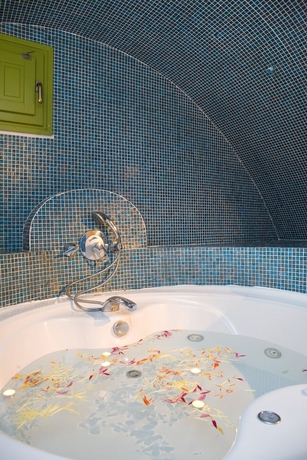 Imagen de la habitación del Hotel Asha Luxury Suites. Foto 11