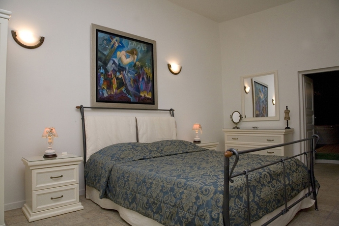 Imagen de la habitación del Hotel Asha Luxury Suites. Foto 14