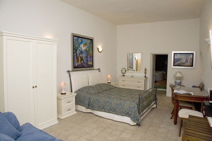 Imagen de la habitación del Hotel Asha Luxury Suites. Foto 16