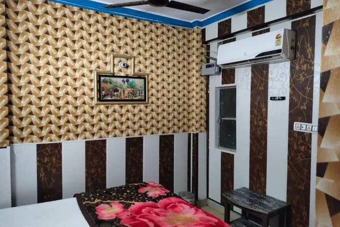 Imagen de la habitación del Hotel Asha Palace. Foto 10