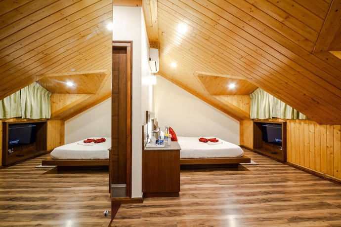 Imagen de la habitación del Hotel Ashapuri Residency Manali - A Centrally Heated and Air Conditioned. Foto 12