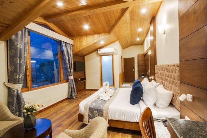 Imagen de la habitación del Hotel Ashapuri Village Manali - A Luxury Resort and Cottages. Foto 11