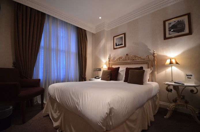 Imagen de la habitación del Hotel Ashburn. Foto 10