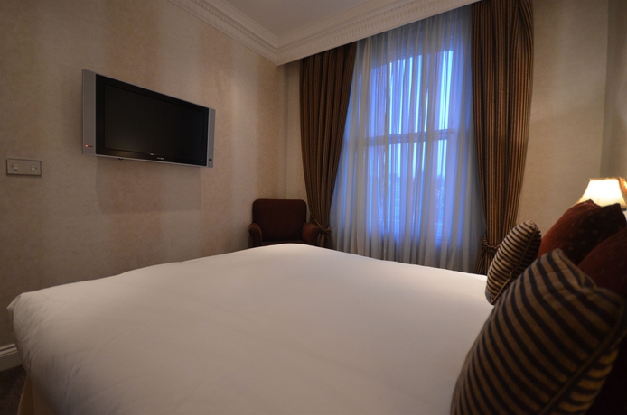 Imagen de la habitación del Hotel Ashburn. Foto 11