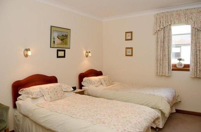 Imagen de la habitación del Hotel Ashcroft Farmhouse. Foto 14