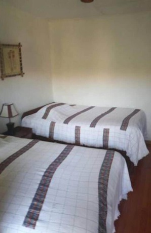 Imagen de la habitación del Hotel Asheton. Foto 16