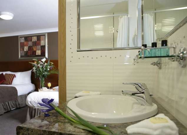 Imagen de la habitación del Hotel Ashford Court Boutique. Foto 7