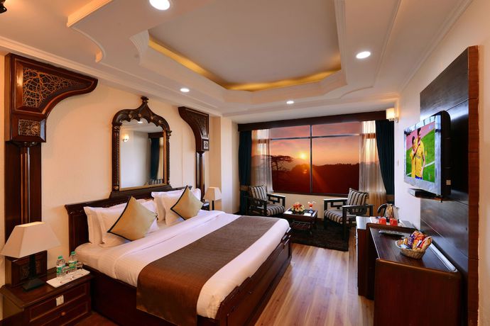 Imagen de la habitación del Hotel Ashiana Clarks Inn, Shimla. Foto 11
