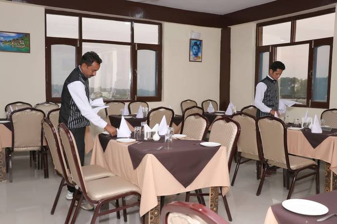 Imagen del bar/restaurante del Hotel Ashiana Palampur. Foto 4