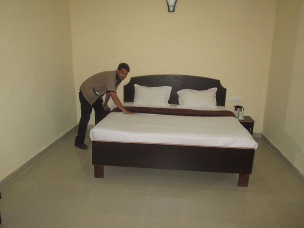 Imagen de la habitación del Hotel Ashiana Palampur. Foto 12
