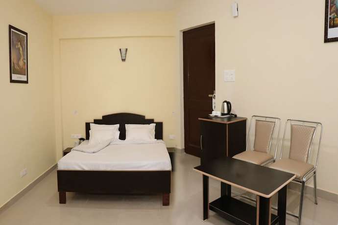 Imagen de la habitación del Hotel Ashiana Palampur. Foto 13