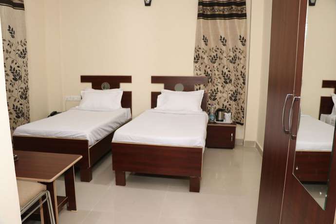 Imagen de la habitación del Hotel Ashiana Palampur. Foto 14