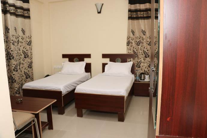 Imagen de la habitación del Hotel Ashiana Palampur. Foto 15