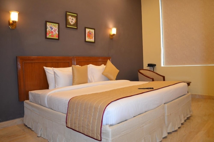 Imagen de la habitación del Hotel Ashira Inn. Foto 10