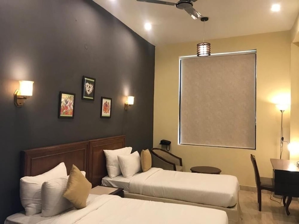 Imagen de la habitación del Hotel Ashira Inn. Foto 11
