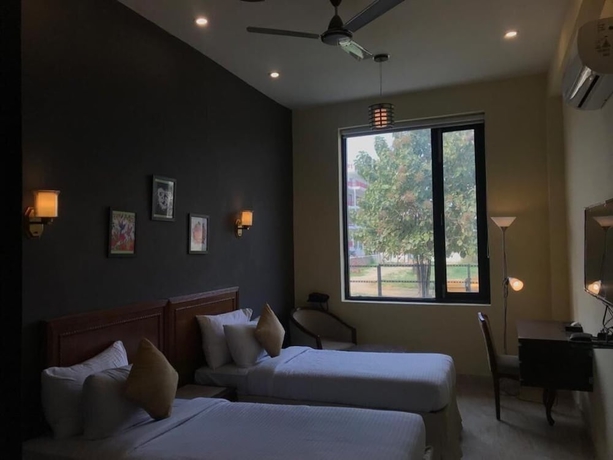 Imagen de la habitación del Hotel Ashira Inn. Foto 13