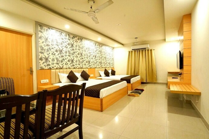 Imagen de la habitación del Hotel Ashirwad International. Foto 10