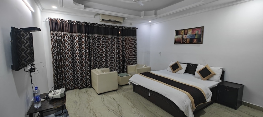 Imagen de la habitación del Hotel Ashiyana Elite. Foto 4