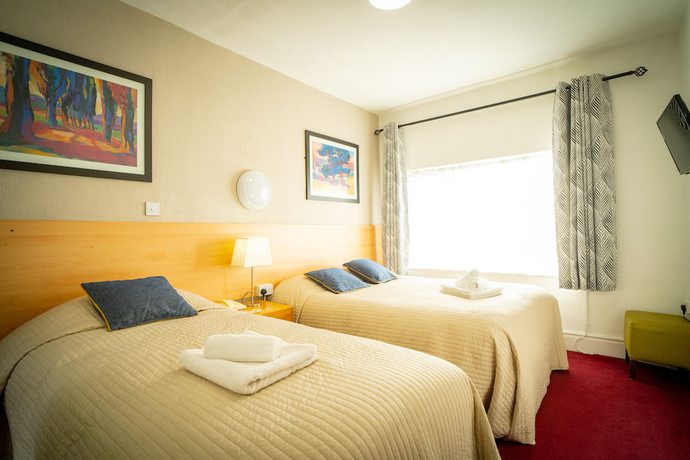 Imagen de la habitación del Hotel Ashley. Foto 14