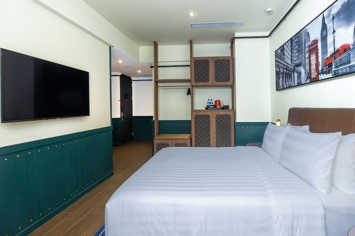 Imagen de la habitación del Hotel Ashley Tugu Tani Menteng. Foto 8